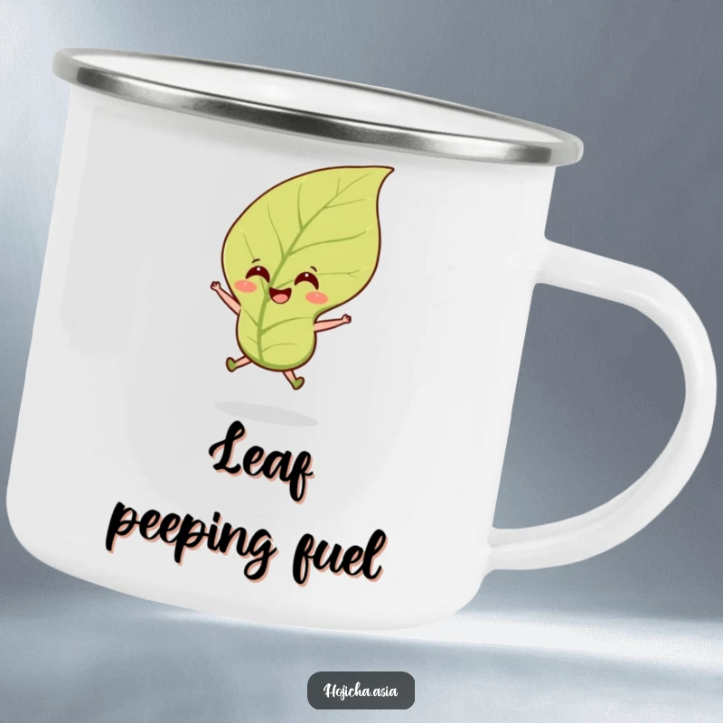 Funny hojicha tea leaf camping mug featuring a smiling leaf leaping in a breeze, ideal for outdoor enjoyment.