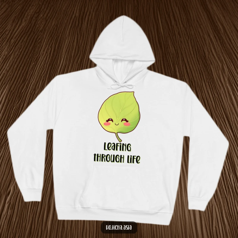 Funny warm hoodie featuring a smiling hojicha leaf with gentle, curious eyes, evoking a sense of peace.