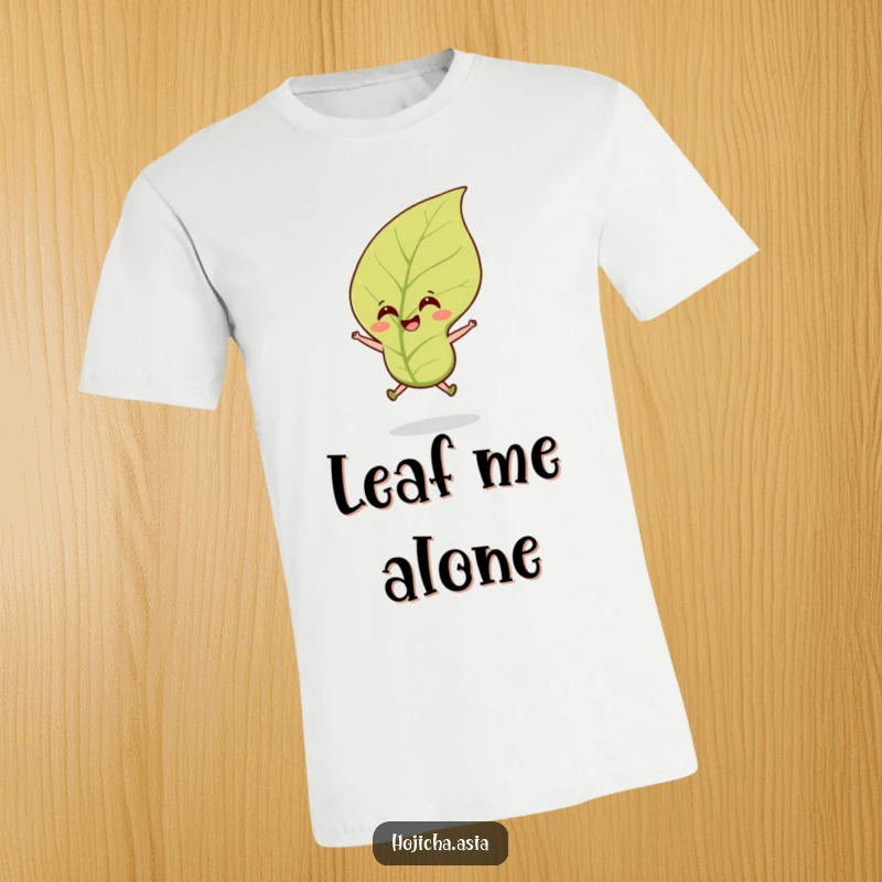 Funny hojicha tea leaf t-shirt showcasing a smiling leaf mid-jump in a breeze, embodying cheerful energy.